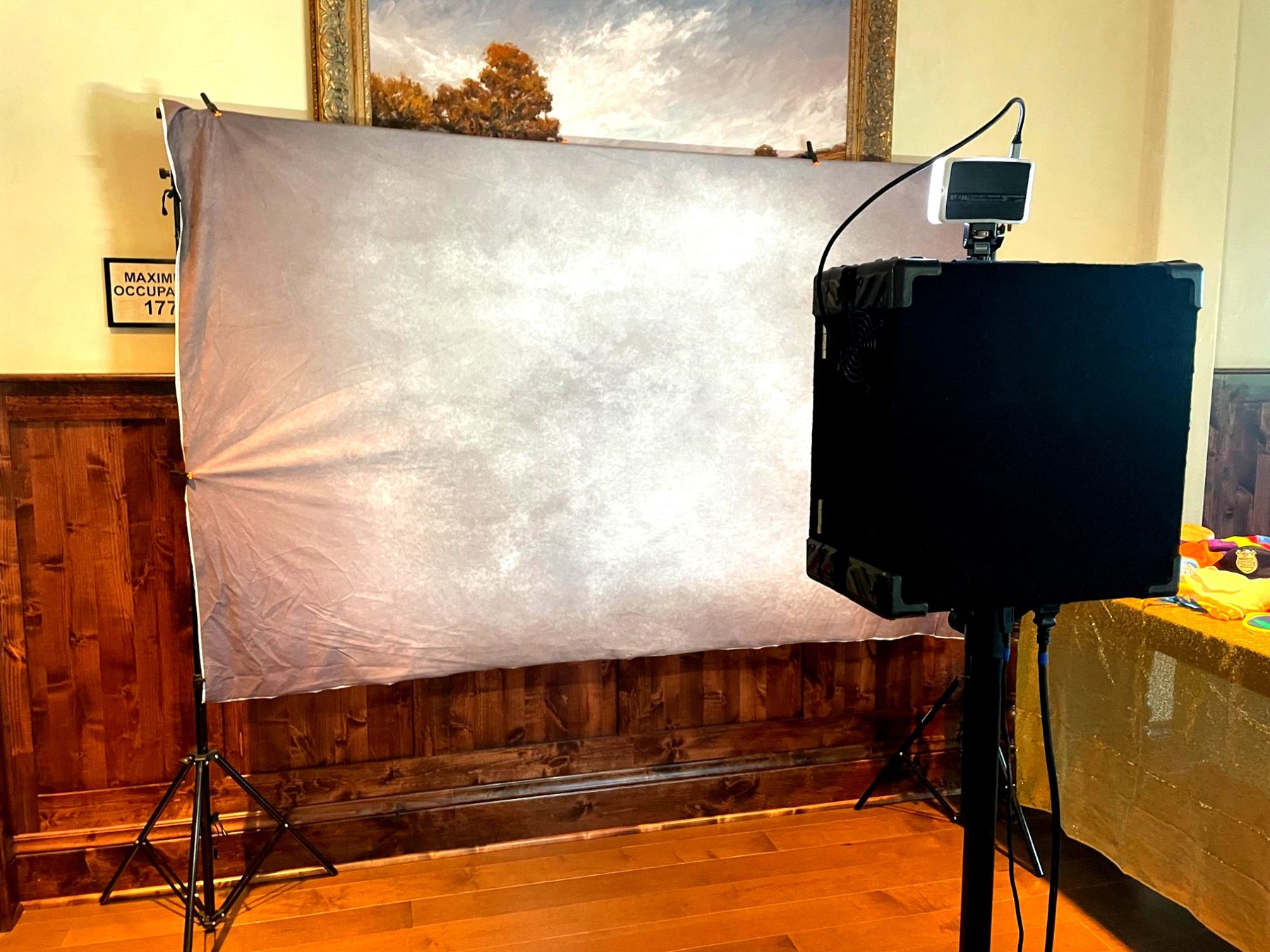 Photo booth set up with a backdrop