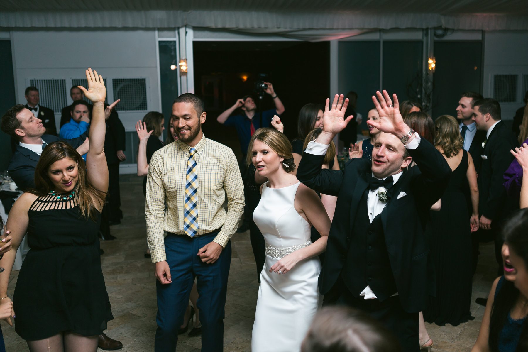 Bride dancing with guests